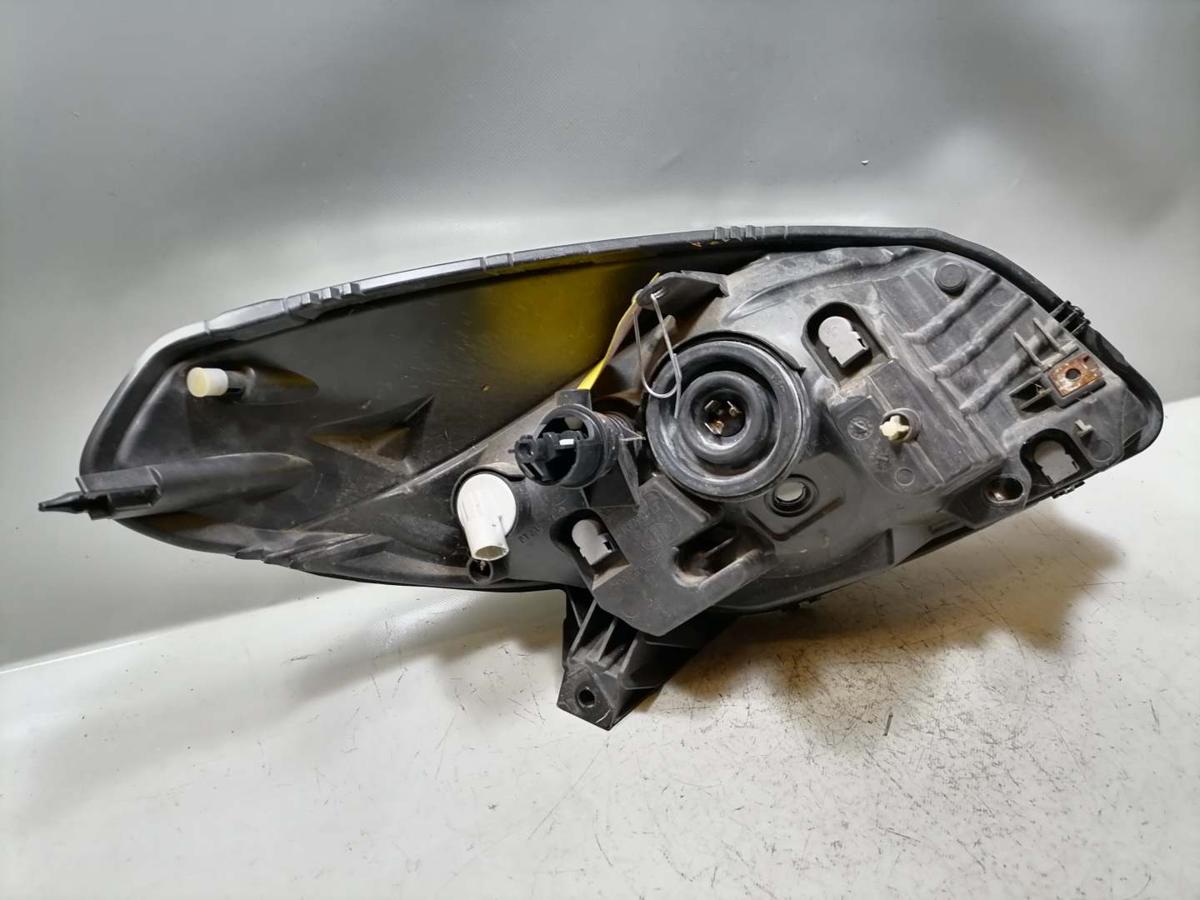 Dacia Sandero original Scheinwerfer links Halogen obehalb leicht vergilbt Bj.2009